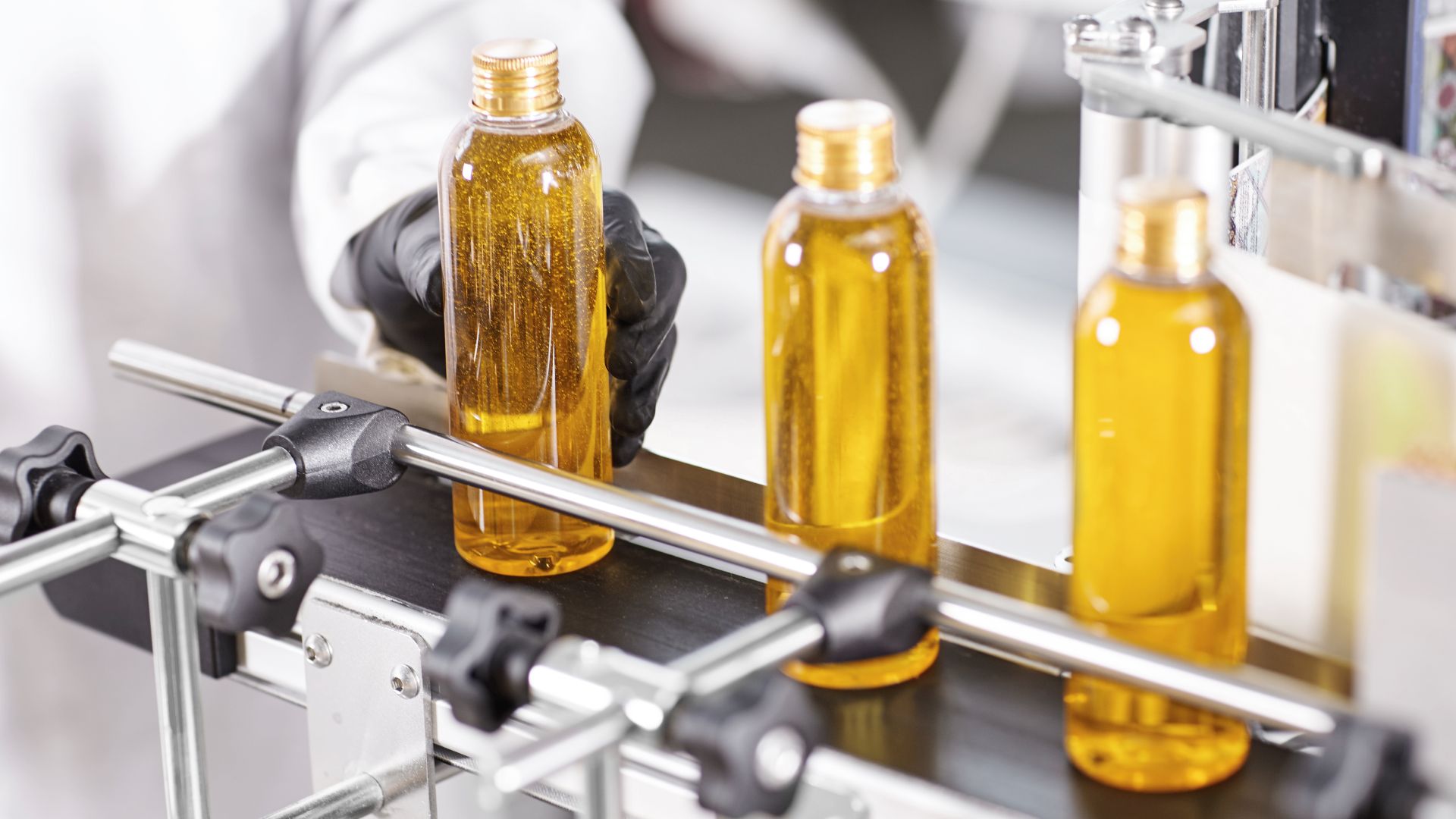 transparent-plastic-bottles-filled-with-yellow-substance (1)